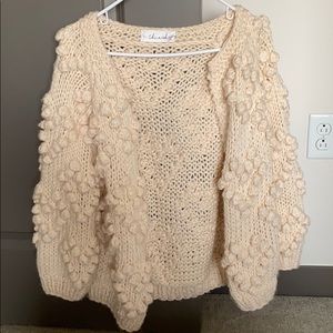 Cute knit sweater!